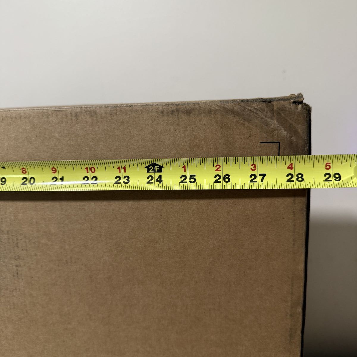 HP carton width measured with a tape measure at about 29 inches