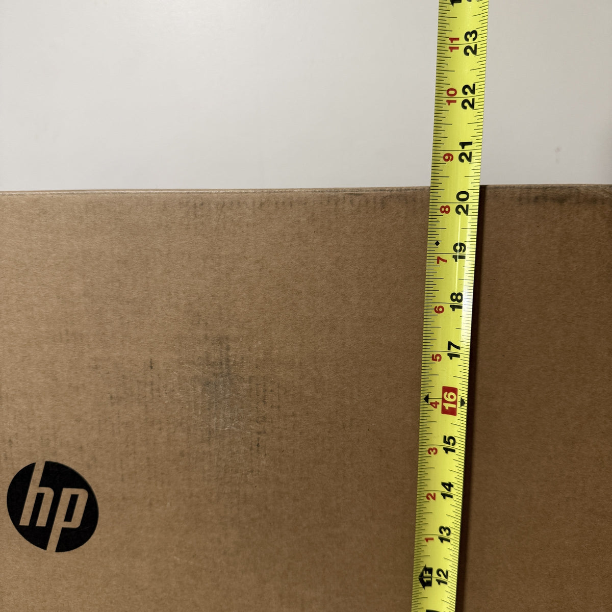 HP carton height measured with a tape measure at about 20.5 inches