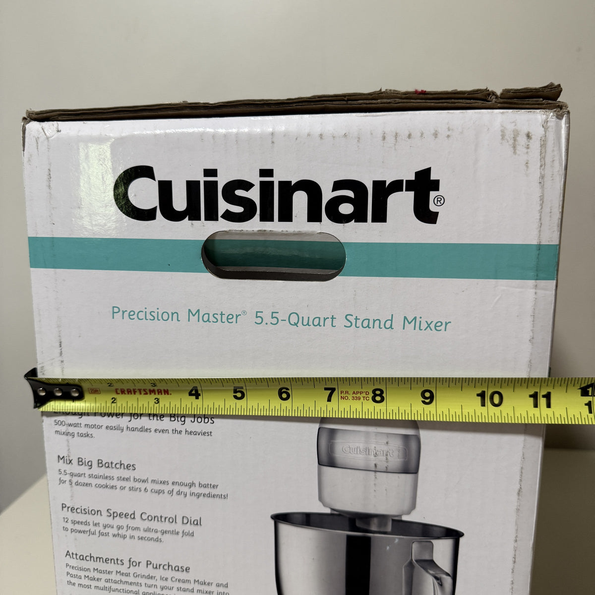 Cuisinart SM-50 box with a tape measure across the short side