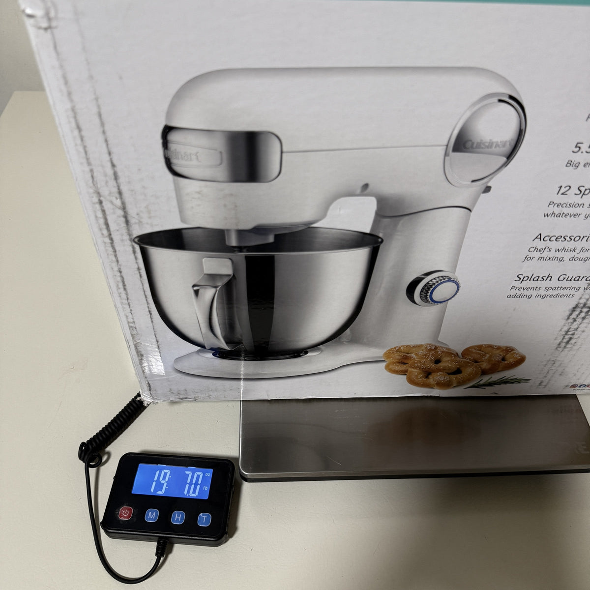 Cuisinart SM-50 box on a digital scale, angled view