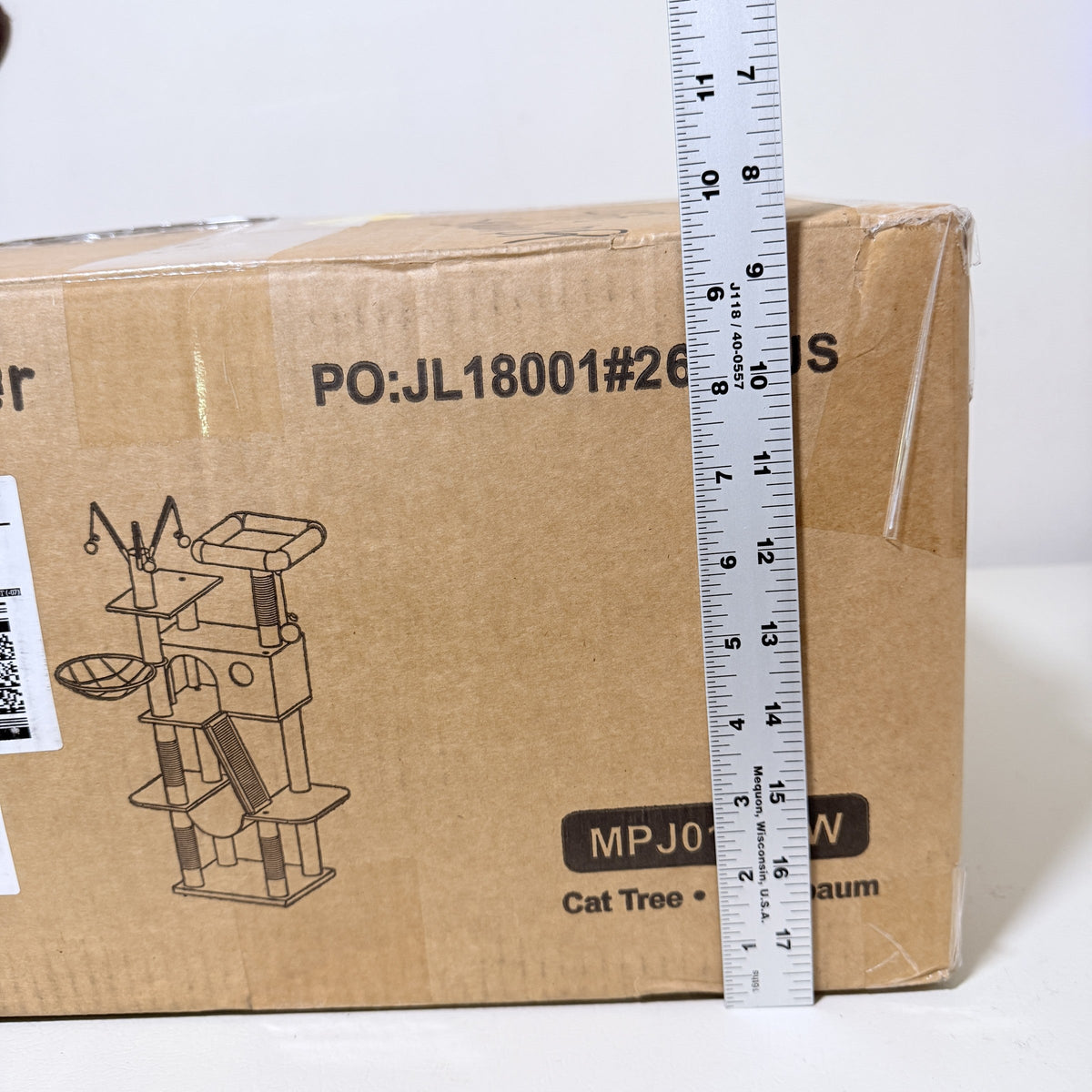 Hey-brother cat tree carton height measured with a ruler