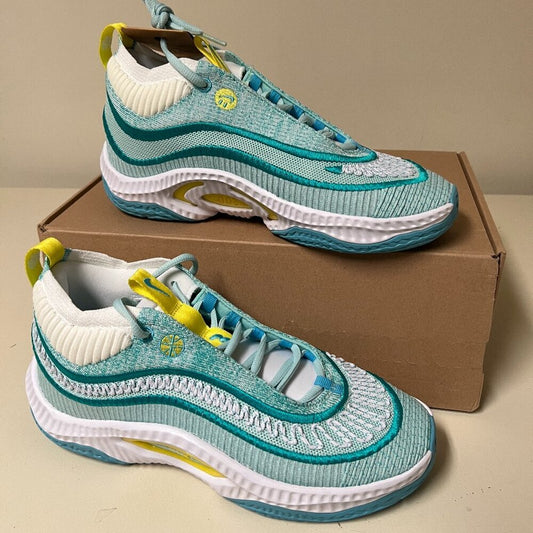 Nike Cosmic Unity 3 basketball shoes in Jade Ice, side profile on the box